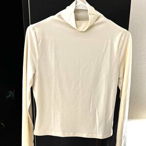 Cream colored small high neck sweater by S Deer